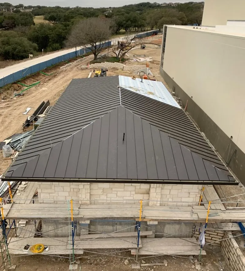 Metal roof new construction with scaffolding in Oxford